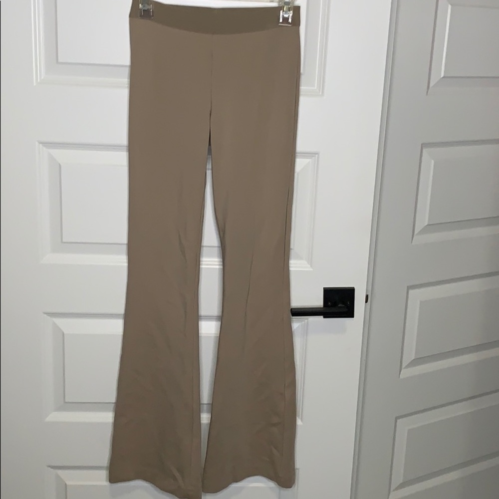 BCBG fitted leg flare cream pants